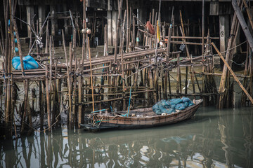 Fototapeta na wymiar Phli Pier, a local fishing port in Chonburi, Thailand