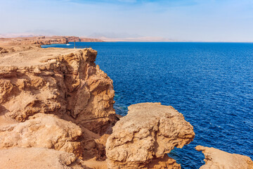 Fototapeta na wymiar Red sea coast shore in the Ras Mohammed National Park. Famous travel destionation in desert. Sharm el Sheikh, Sinai Peninsula, Egypt.