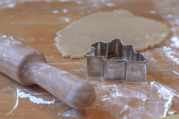  Gingerbread cookies. rolled dough, rolling pin and Christmas tree shape