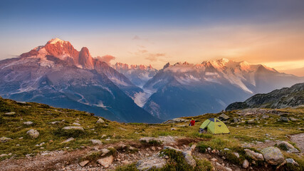 beautiful sunset by the lake under the snowy Mont Blanc