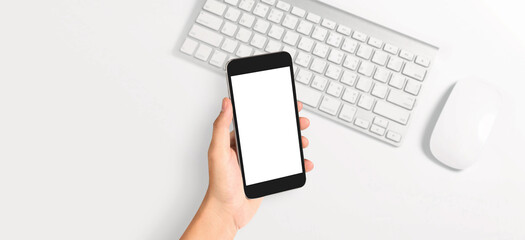 Hand holding smartphone device touching screen