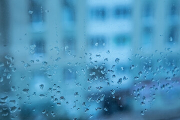 Rain Drops On Glass With City Background