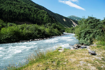 Naklejka na ściany i meble View of the mountain river. River in the North Caucasus mountains