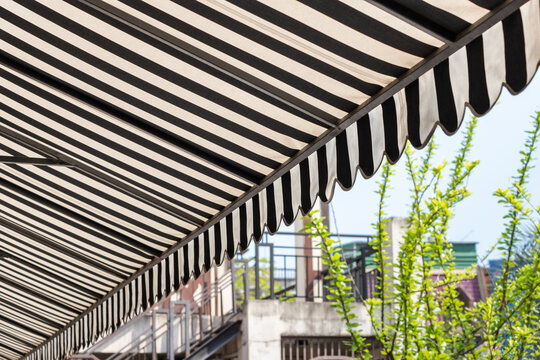 black and white striped awning.