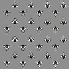Seamless pattern in geometrical style. Black, gold and light gray colors are used on the gray background.
