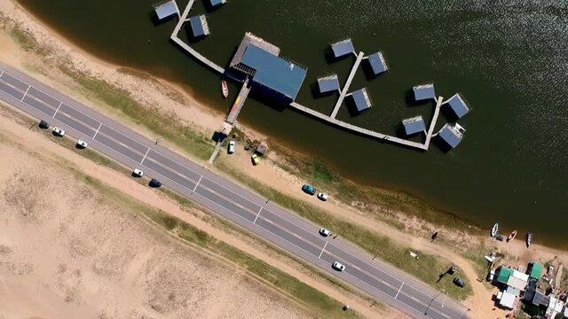 Drone landing next to  the dark ocean water in Garzon, Maldonado, Uruguay