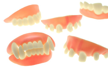 Sets of Novelty Teeth on a White Background