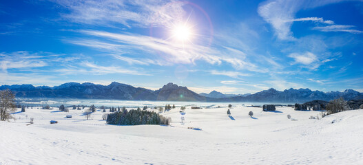 panoramic landscape at winter with alps mountains in Bavaria