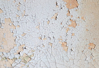 Old painted wall, peeling paint texture.
