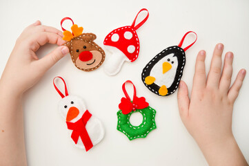 Christmas tree toy handmade from felt. Material for creativity.