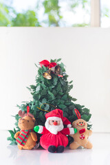 reindeer bears cookies and christmas decorations next to santa claus have fun around a christmas tree