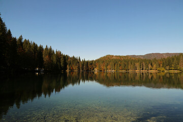 Fototapeta na wymiar Autumn in the Fusine lakes Natural Park, Italy