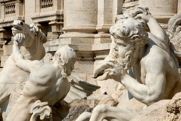 The Trevi Fountain is the largest and most famous fountain in Rome. Beautiful details of the horses led by Oceano.