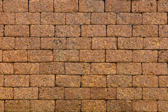 Laterite stone wall background.