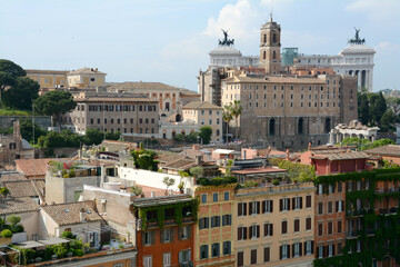 Fototapeta na wymiar Panorama of Rome from the Palatine Hill on San Teodoro street, the Roman Forum, the Capitoline Hill and the Altar of the Fatherland.
