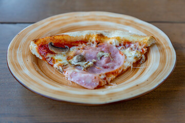 Textured surface of cheese pizza with spices. Homemade fresh baking recipe