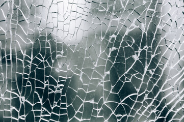 Broken safety glass, cracked glass.