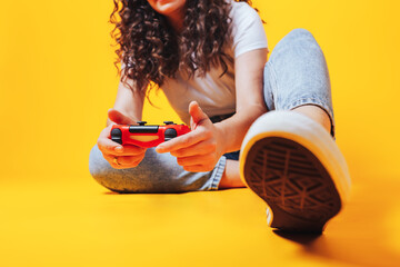 Woman playing video games, free time activity, new hobby woman during self-isolation, woman in...