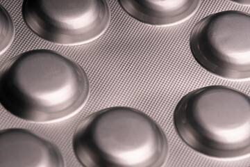 Close up view of a silver blister with medical pills