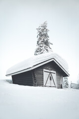 Cabin hut in the snow