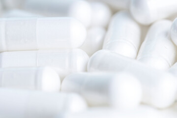 Heap of white pills on a white background, Healthcare and Medicine