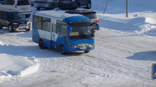Kazakhstan, Ust-Kamenogorsk, february 20, 2020: Chinese bus FAW on one of the streets of the city. City Bus. Public transport. Winter snow