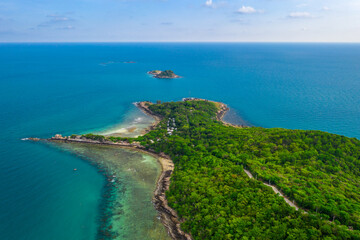 Fototapeta na wymiar Tropical beach with turquoise ocean in paradise island. Aerial view. Paradise resort.
