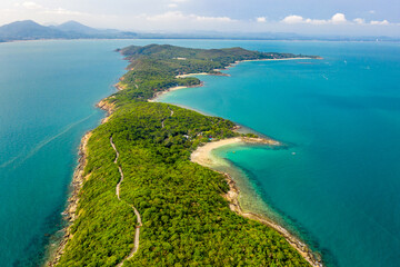 Tropical beach with turquoise ocean in paradise island. Aerial view. Paradise resort.