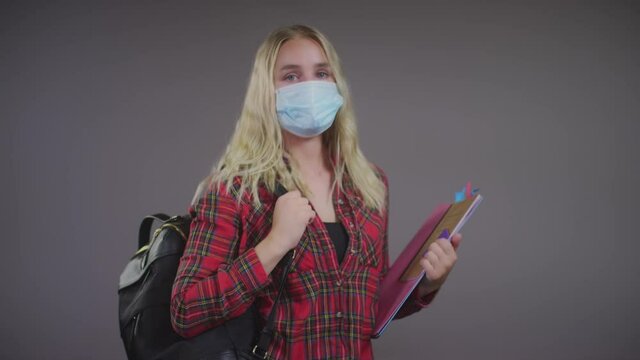 Young Caucasian Blonde Female Student Wearing Face Mask