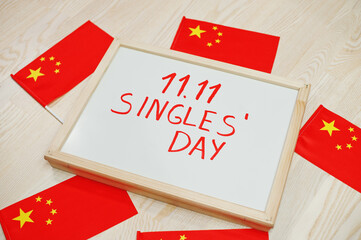 Chinese singles day theme. Board with China flags.