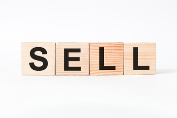 word SELL on wooden blocks, white background, business concept. business and Finance