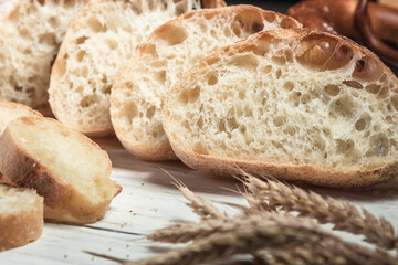 Various rustic bread on a wooden board. Healthy food and farming concept