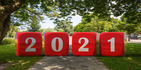 New year 2021 white digits number on red cubes, green nature background, sunny day. 3d illustration