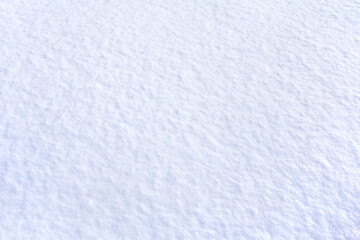 Fresh white blue snow in winter. Snowy surface, background, texture