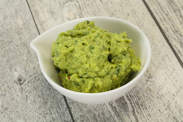 Avocado guacamole sauce with chili pepper