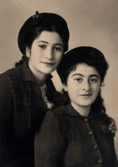 A vintage photo portrait from 1951 of Armenian sisters.