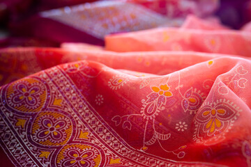Red fabric in flower pattern as a background