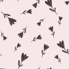 Seamless random pattern with dark brown tulip flowers silhouettes. Light pink background.