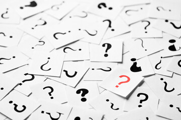 Pile of question mark signs scattered around