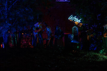 Haunted house, witches, impaled heads, ghouls, werewolf, gravestones terrify under a full moon in...
