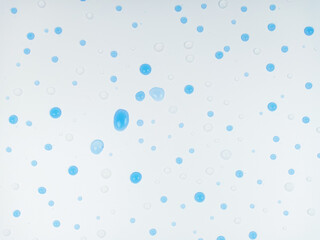 Fototapeta na wymiar Clear and blue water drops on white background.