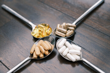 on four tablespoons there are different tablets and pills