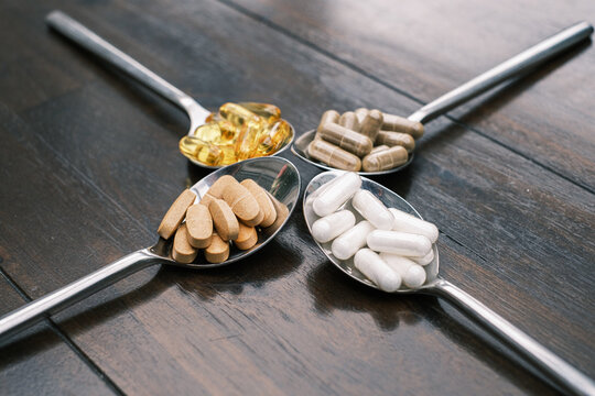 on four tablespoons there are different tablets and pills