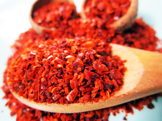            The pile of a crushed red pepper, dried chili flakes and seeds (Turkish name; Pul biber)                      - Powered by Adobe
