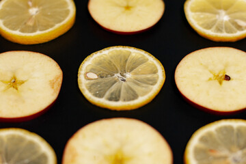 Fruit Apple and lemon slices on the screen.