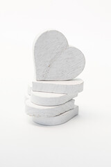 Fototapeta na wymiar White wooden heart on isolated white background. heart-shaped set. Valentine's Day, Love concept. romantic design