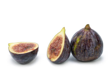 Fresh Black figs on isolated white background. Whole and sliced.