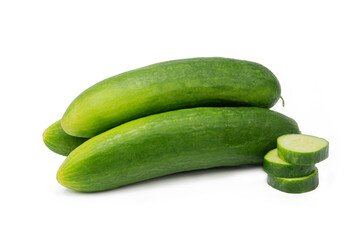 Fresh cucumbers on isolated white background. whole and sliced.