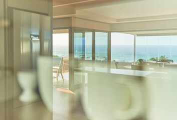 Reflection of sunny scenic home showcase ocean view