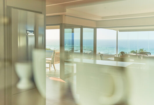 Reflection of sunny scenic home showcase ocean view